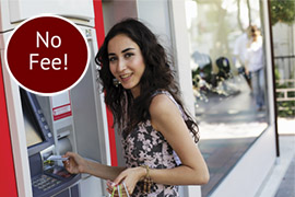 Picture of Smiling woman at ATM